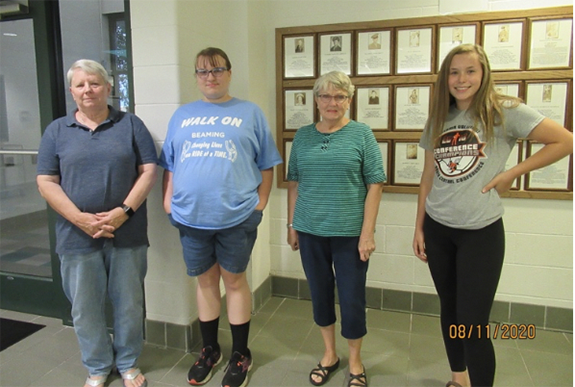 Patricia Lehman, Savana Hiltz, Jane Wilcox and Haylee Moore were welcomed as new members of the Wolman-Minskey American Legion Auxiliary Unit 317. Not pictured are Joan Holtz, Alice and Kennedy Miller. 
