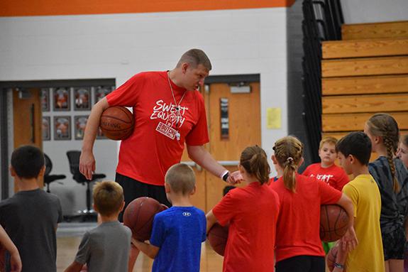 Brian Butch speaks to the students enrolled in the morning session of the basketball camp on July 29. With over 60 students from across the area attended the sessions offered for 1st – 4th and 5th – 8th Graders at Wautoma High School.