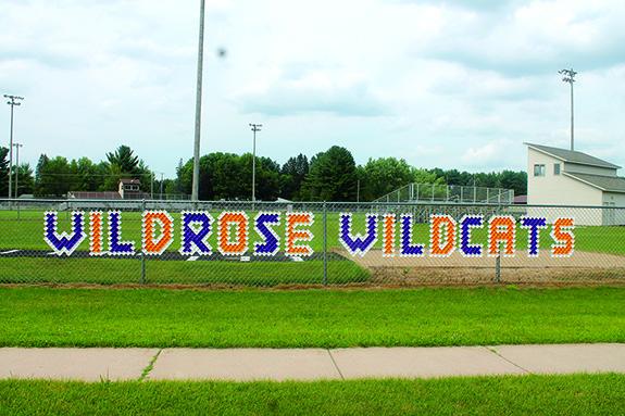 A special feature was added to the chain link fence on the east side of the Wild Rose athletic field this summer. 
