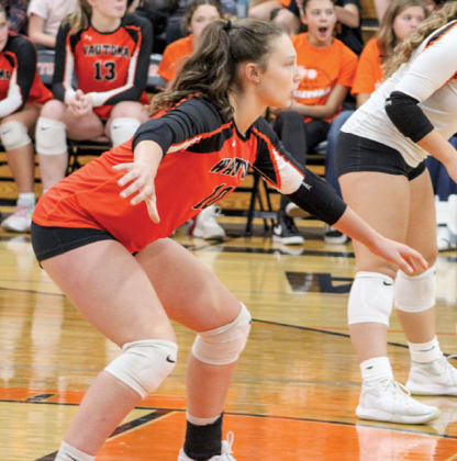 Hornet, Laynie Vaughan, in complete concentration as she waits for the Nekoosa Papermakers to return the ball to her hive during Sept. 19. match. 