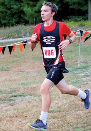 Tri-County’s Jacob Bacon finishes with a time of 25:21.34 in the boys’ novice race.