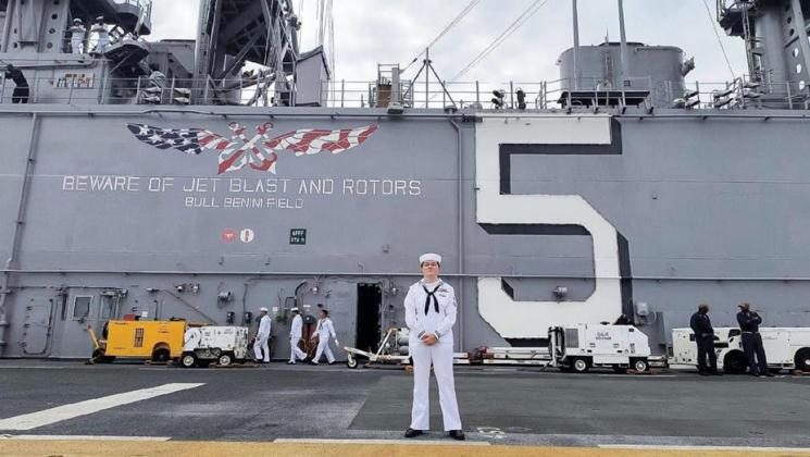 Once a 4-H member herself, Jasmine Klawitter is currently serving on the USS Bataan which is now in the Red Sea off of Israel. Jasmine is pictured in front of her naval ship.