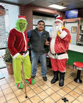 Tony Torres, owner of El Popo, contributed gift certificates to help K and L Fubar Trucking and Hawlish Lawncare LLC spread holiday cheer in Wautoma.