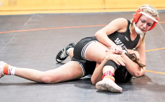 Lyvia Weiss pins down her Wisconsin Dells opponent during the Jan. 4 Wautoma/Wild Rose Quad. The Lady Hornet Wrestlers scored 6 points while the Lady Chiefs scored 18 points.