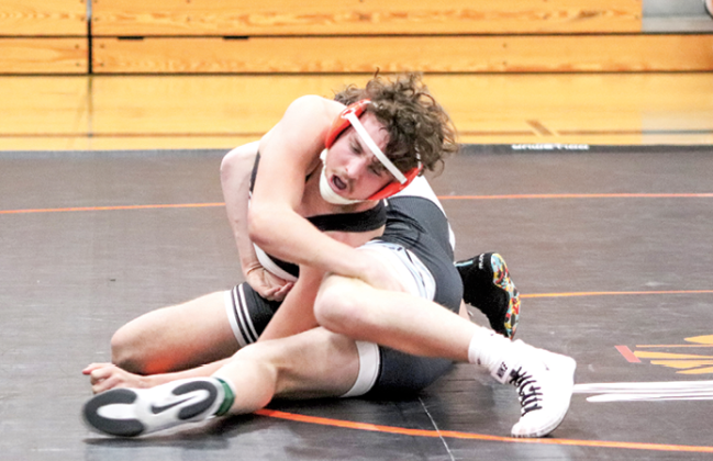 Brady Abitz is able to get the advantage over his Wisconsin Dells opponent.