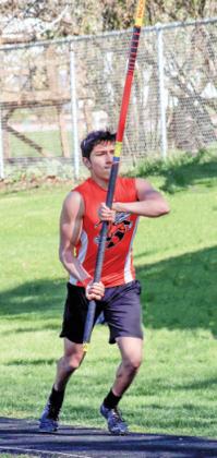 Wautoma senior Isai Lezama gets ready for the pole vault, where he reached a height of 9’6.
