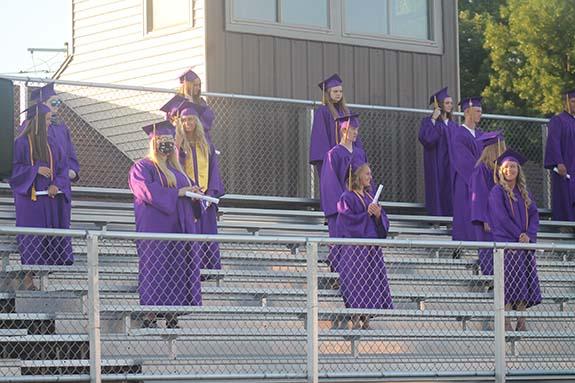 Wild Rose High School grads of 2020 stood on the homestands of the football/track field to be formally presented as graduated near the end of the July 24 ceremony.