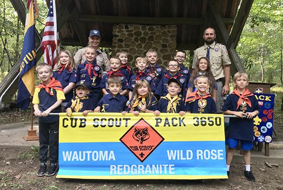 Cub Scout Pack 3650 held their advancement ceremony on Sept. 13. Pictured in the back row are: Committee Chair Amanda Jalensky, Xander Fischbach, 7, Mason Malin, 9, Korban Withall, 9, Cubmaster Joshua Scott; middle row: Paris Pierce, 7, Levi Jalensky, 7, Dominic Scott, 7, Connor Novak 7, Ryker Withall 7, Atlea Ehrke, 8; front row: Charlie Jarvis, 6, Eli Nigl 5, Brentin Nigl 7, Evelyn Ehrke 5, Cody Jalensky 5, Bently Evens 6, Mark Washburn, 6; and not pictured are: Jacob Arch, 6, and Gavin Giebel, 8.