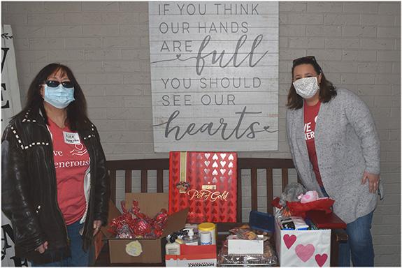 Rachel Pekowsky, right, of Thrivent Action Team and Robin Lotz, left, worked together to organize the Thrivent Action Team Valentine’s Day Event.