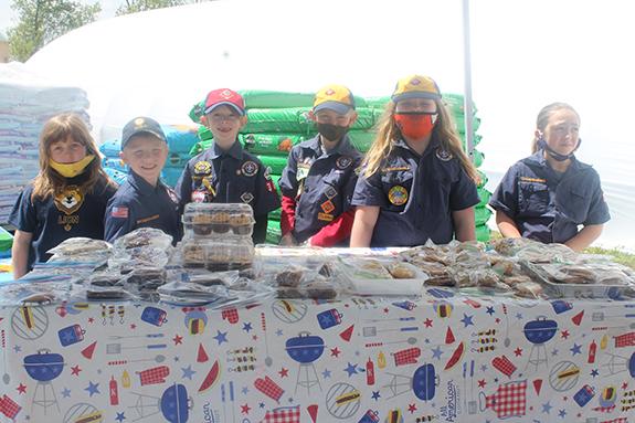Cub Scouts hold brat fry and bake sale
