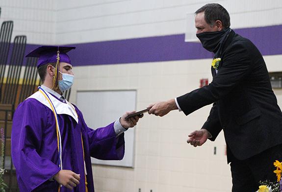 Trevor Gray was recognized as one of the eleven honor graduates during the ceremony by Chris Grinde.
