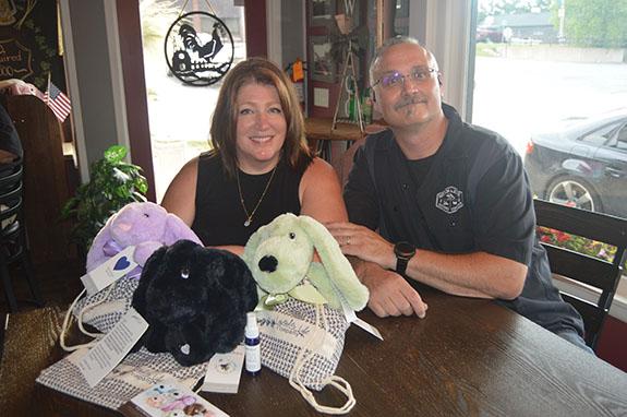 On July 10th, the Coloma Mecan River Brewing Company hosted an evening of entertainment to bring awareness to Community Foster Care. Shown here are Wendy and Bill Moll, owners of the Brewery and now official. “Community Partners” for the State of Wisconsin with Lavender Life Company to help spread much needed therapy to children in Foster Care. The Xander Bear Backpacks were promoted and still available by contacting Wendy to further raise funding for Foster Care.