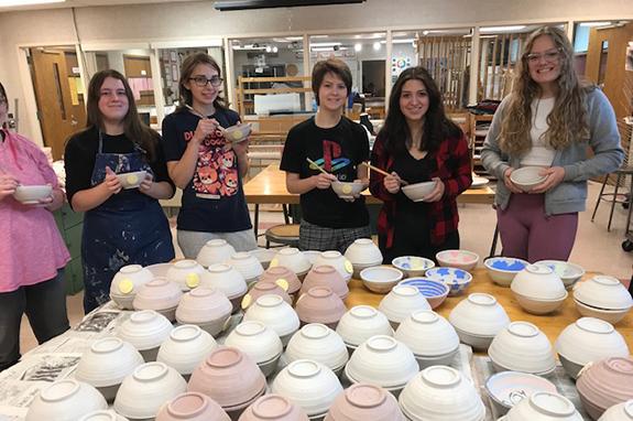 Westfield High School students Piper Watry, Hannah Smolek, Jade Murphy, Macey Krueger, Caroline Aguilar, and Lily Volz display the bowls to be used in the Dec. 6th fundraiser.