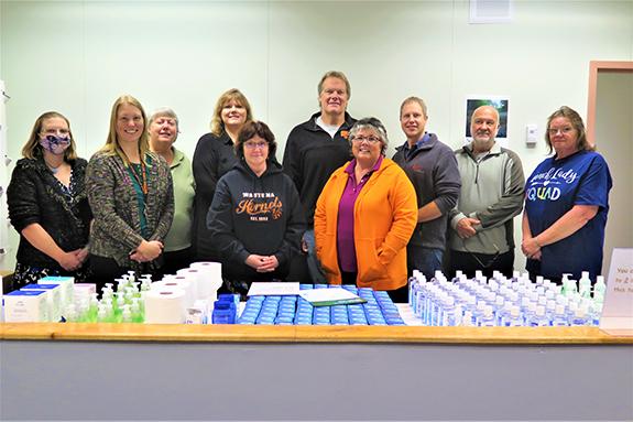 This group of Hornet Market volunteers (and others not present for the photo) have been instrumental in the development and operation of the Hornet Market at Parkside Middle School in Wautoma: (back) Andrea Braatz, Julie Mesman, Tami Stansbury, Wautoma Area School District Food Service Director and Coordinator of Hornet Market, Carl Mesman, Greg Giebel, Steve Sommers, Shirley Schloesser, (front) Alysson Bowden, Diane Sommers, and Deb Rosenow.  The market, which opened at the beginning of the school year, pr