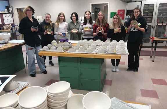 Westfield Area High School Art Students show off some of the bowls prepared for Monday’s Bowls for Hunger on Dec. 6: Alisa Weisensel, Braylee Wolff, Hannah Lietz,  Brittany Goldsmith, Audrey Tassler, Chloe Wolaen, Lexi Lloyd, and Jade Murphy.