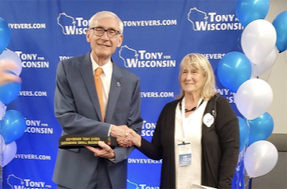 Governor Tony Evers was awarded an Honorary Black Belt, presented to him by Joanne Nelson of the American Martial Arts Academy of Wautoma.