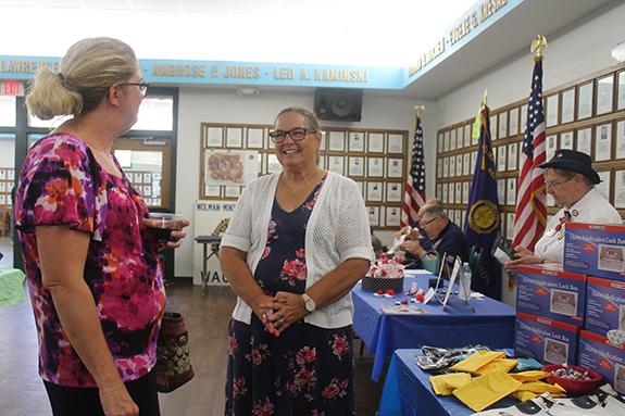 Jennifer Koeppl and Mary LaBlanc chat at the Human Services table during the Waushara Area Chamber of Commerce’s small business BA5.