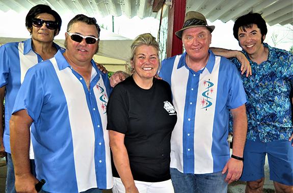 Milty Wilty Drive-In owner, Cindi Sommer, posed for a picture with the entertainers who performed at the 75th Anniversary celebration.  Pictured are:  Dan Sanchez, Mike Peterson, Ron Van Den Busch, and Elvis John.  The drive-in was first started in Wautoma by Sommer’s father, Milton, in 1947.