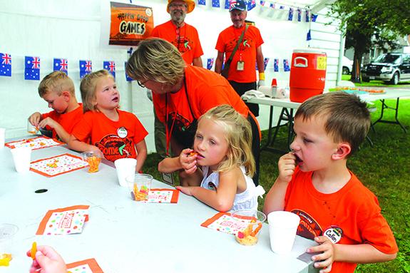 Participants in the Grace Bile Church’s Vacation Bible School in Wild Rose on July 19 had snacks of “coral” and “fish” in cups with Kathy Landing making sure they understood that they would see those in Australia as the theme of the VBS was Zoomerang. Pictured eating their “coral” and “fish” are Jace Jalensky, Loralie Useman, Sonja Etheridge, and Callen Dickson.