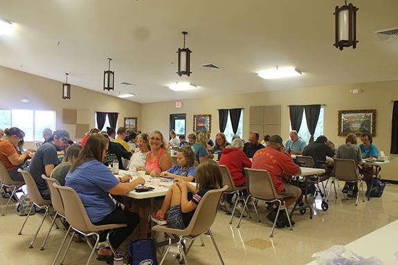 Families busied themselves with the playing of bingo at Camp LuWiSoMo family day.