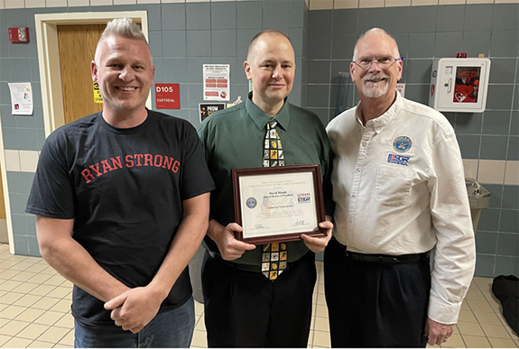 Westfield Area Middle and High School Principal David Moody (center) was presented with the Patriot Award to recognize his support of his employee Staff Sergeant Steven Jones (left). Also pictured is Colonel John Gessner (retired).