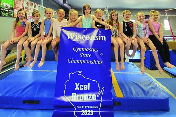 The Wautoma Gymnastics Xcel Bronze team traveled for the Gymnastics State Championships. The team placed first, taking the state champion title on April 1. There were 15 teams total that competed at Bronze level. The Bronze team includes: Rylee G, Sykora R, Kenadie S, Jada C, Ayanna T, Joscelyn B, Hayden H, Oaklei B, Harper H, Anna M, and Autumn T. Not pictured Evelyn R and Mia J.