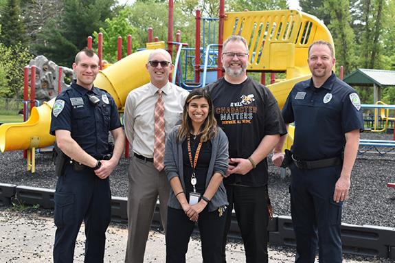 Pictured are: City of Wautoma Police Officer Dominic Ehrke, District Administrator Tom Rheinheimer, Riverview Elementary Principal and Incoming District Administrator Jewel Mucklin, School Resource Officer Lafe Hendrickson, and City of Wautoma Police Chief Paul Mott.