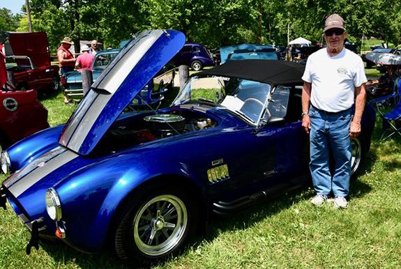 Bob Janda of Waupaca, proudly displays his 1965 Superformance 427 Cobra.  He’s owned it for the past 21 years.