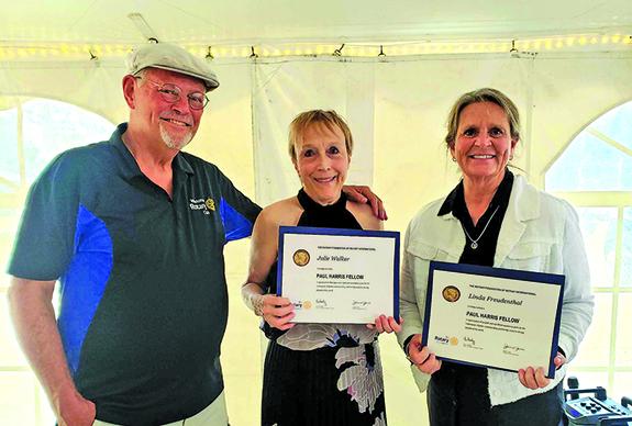 Craig Walker presented Julie Walker and Linda Freudenthal with Paul Harris Fellow Awards for their outstanding contribution to Wautoma Rotary and the community.