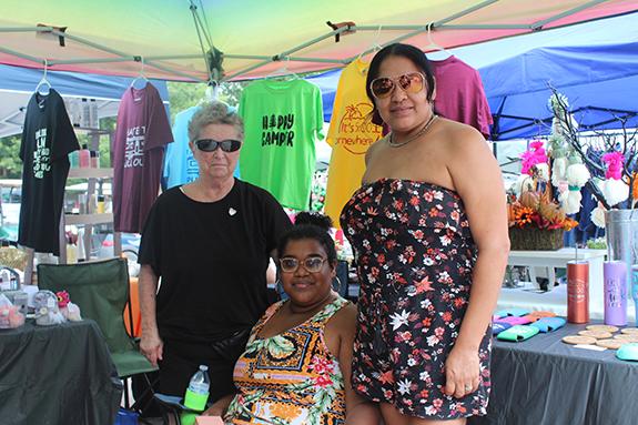 Judy Gurrath, of Campbellsport, Deliz and Deliana Carmona, of Neenah, manned a booth of many fun treasures from shirts to mugs and more at the vendor fair.