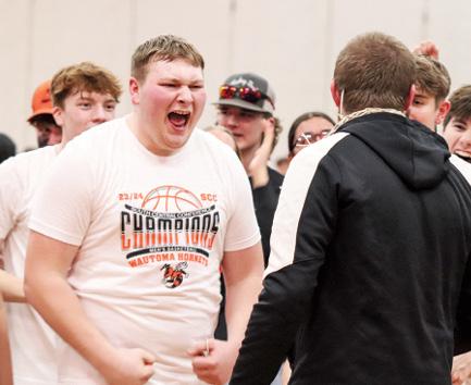 Senior Peter Idsvoog celebrates the Hornets first conference championship title in 41 years. 
